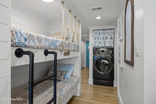 8801 Reed Dr Unit 303W, Emerald Isle, NC 28594 - laundry area featuring washer / clothes dryer, wood finished floors, and recessed lighting