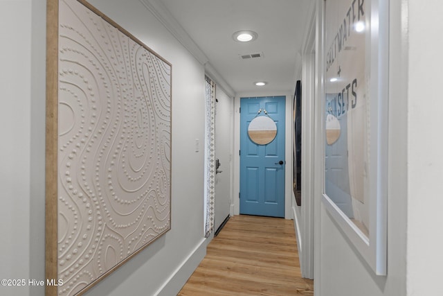 8801 Reed Dr Unit 303W, Emerald Isle, NC 28594 - doorway to outside with light wood-type flooring and recessed lighting