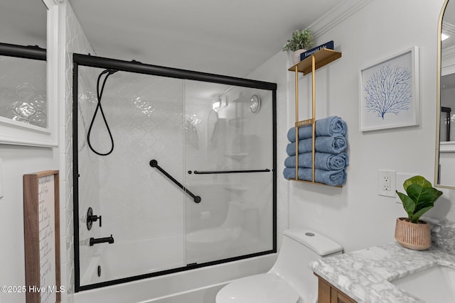 8801 Reed Dr Unit 303W, Emerald Isle, NC 28594 - bathroom featuring vanity and enclosed tub / shower combo
