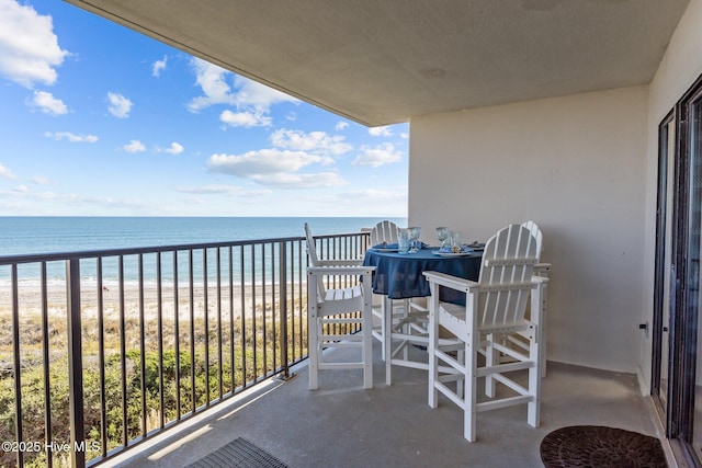 8801 Reed Dr Unit 303W, Emerald Isle, NC 28594 - balcony featuring view of water and beach