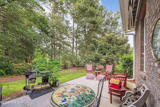 3716 Pond Pine Ct, Southport, NC 28461 - view of patio featuring a grill