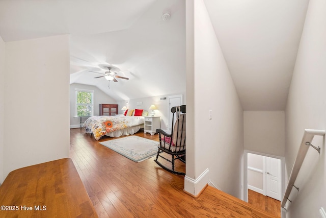 3716 Pond Pine Ct, Southport, NC 28461 - bedroom featuring vaulted ceiling, hardwood / wood-style floors, and ceiling fan