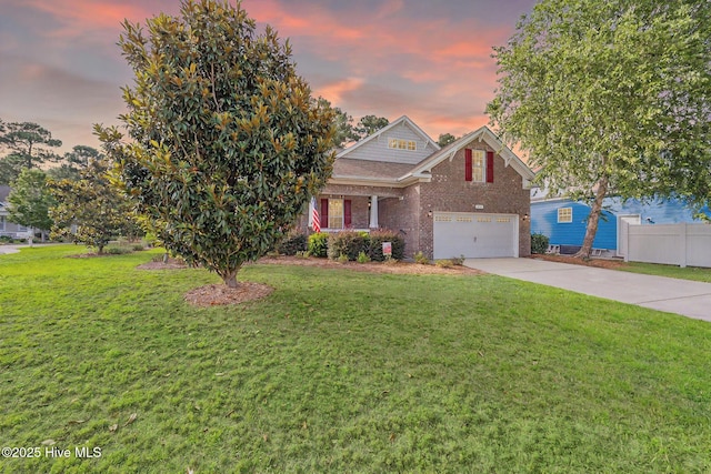3716 Pond Pine Ct, Southport, NC 28461 - view of front facade with brick siding, driveway, and a garage