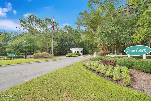 3716 Pond Pine Ct, Southport, NC 28461 - view of street featuring street lights and curbs