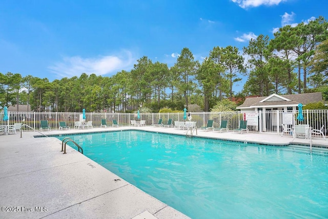 3716 Pond Pine Ct, Southport, NC 28461 - community pool with a patio area