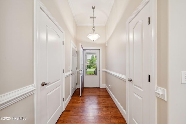 3716 Pond Pine Ct, Southport, NC 28461 - entryway featuring wood finished floors and ornamental molding