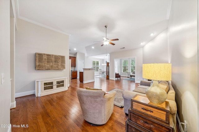 3716 Pond Pine Ct, Southport, NC 28461 - living room with ceiling fan, recessed lighting, wood finished floors, crown molding, and lofted ceiling