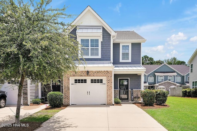 1022 Summer Woods Dr, Wilmington, NC 28412 - view of front of house with concrete driveway, brick siding, and a garage