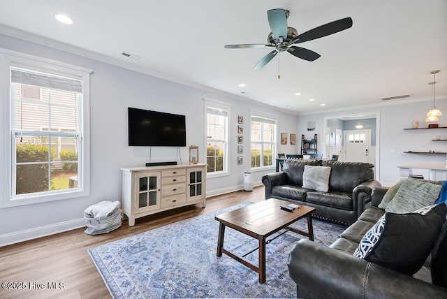 1022 Summer Woods Dr, Wilmington, NC 28412 - living area with wood finished floors, a ceiling fan, recessed lighting, and ornamental molding