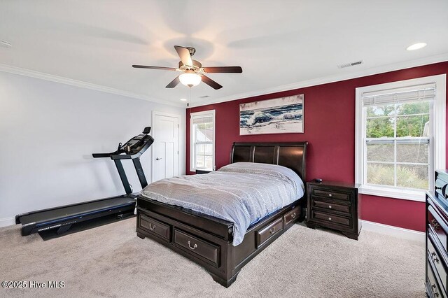 1022 Summer Woods Dr, Wilmington, NC 28412 - carpeted bedroom with multiple windows, ornamental molding, ceiling fan, and recessed lighting