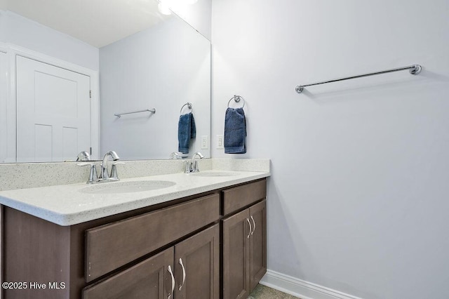 1022 Summer Woods Dr, Wilmington, NC 28412 - bathroom with double vanity and baseboards