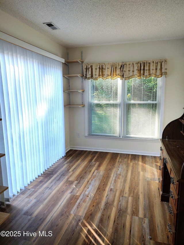 31 Mulberry Ln, New Bern, NC 28562 - unfurnished room featuring wood finished floors and a textured ceiling