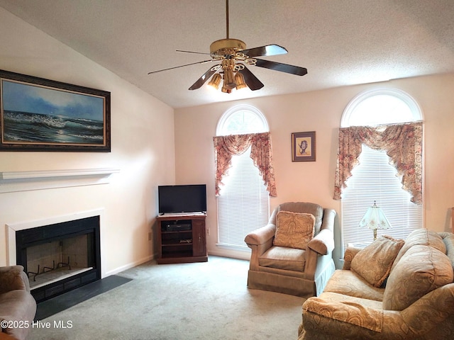 31 Mulberry Ln, New Bern, NC 28562 - carpeted living room with a ceiling fan and a fireplace with flush hearth