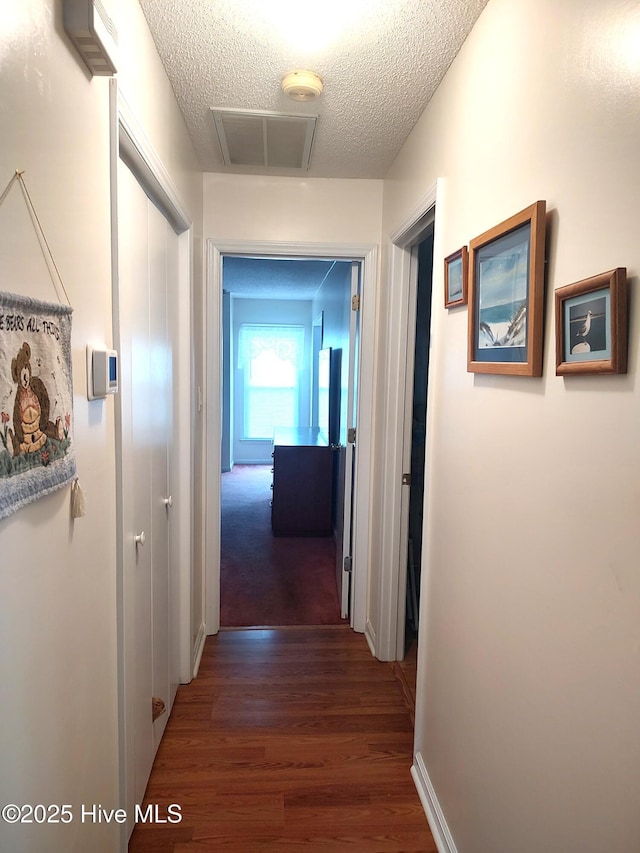 31 Mulberry Ln, New Bern, NC 28562 - hall with wood finished floors and a textured ceiling