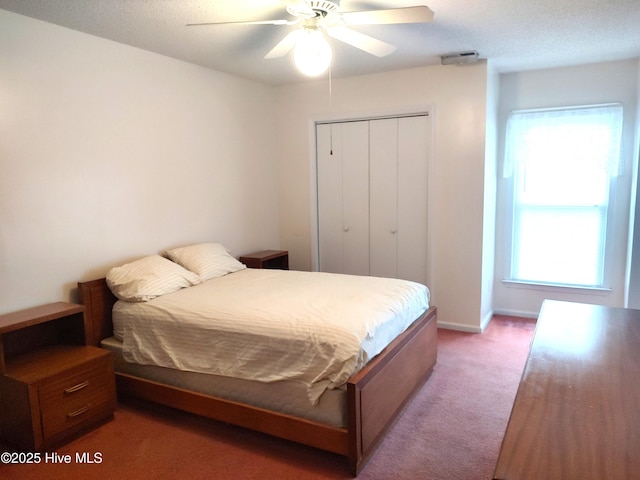 31 Mulberry Ln, New Bern, NC 28562 - bedroom featuring light colored carpet, a closet, and a ceiling fan