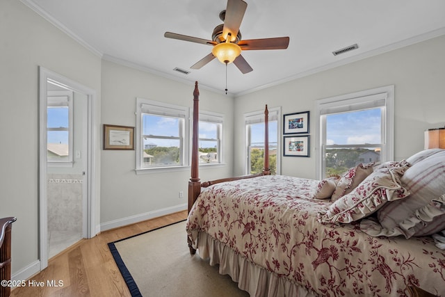 120 Windjammer Dr, Surf City, NC 28445 - bedroom featuring light wood-type flooring, ornamental molding, and ceiling fan