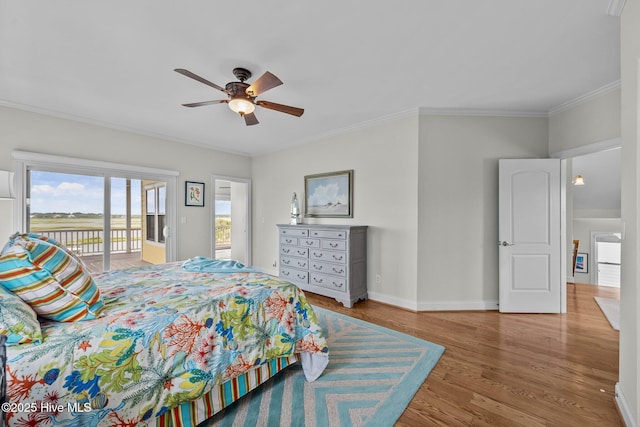 120 Windjammer Dr, Surf City, NC 28445 - bedroom with access to exterior, wood finished floors, crown molding, and a ceiling fan