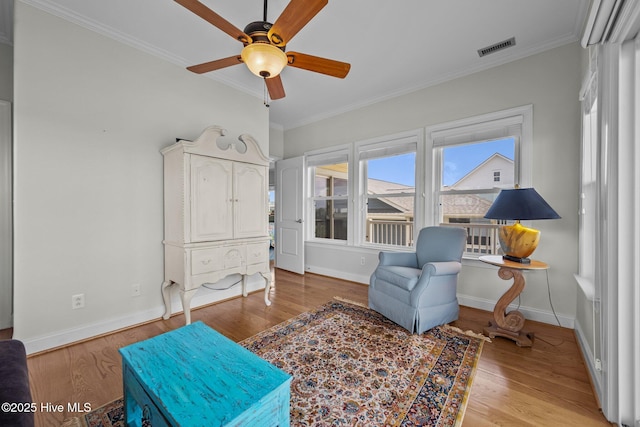 120 Windjammer Dr, Surf City, NC 28445 - sitting room featuring ornamental molding, a ceiling fan, and light wood-style floors