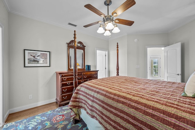 120 Windjammer Dr, Surf City, NC 28445 - bedroom with wood finished floors, ornamental molding, and a ceiling fan
