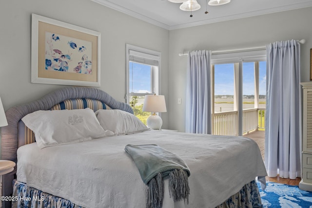 120 Windjammer Dr, Surf City, NC 28445 - bedroom with access to outside, crown molding, and wood finished floors