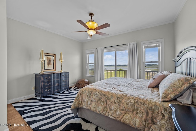 120 Windjammer Dr, Surf City, NC 28445 - bedroom featuring access to outside, wood finished floors, ornamental molding, and ceiling fan