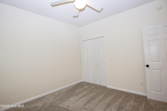 130 Pinecone Ct, Seven Lakes, NC 27376 - unfurnished bedroom with carpet, a closet, and a ceiling fan