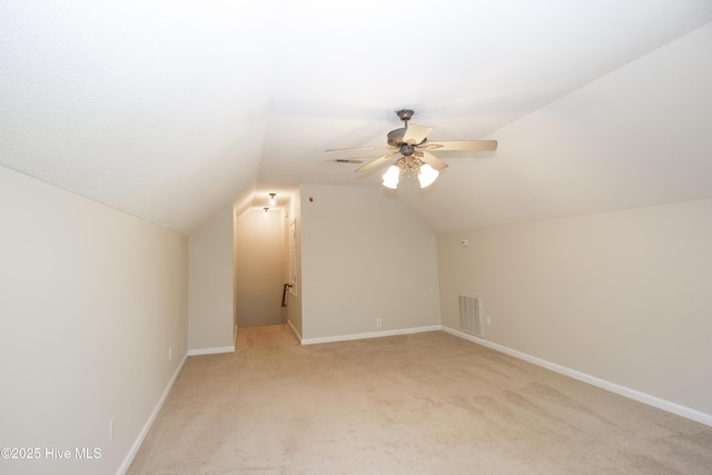 130 Pinecone Ct, Seven Lakes, NC 27376 - additional living space featuring light carpet, vaulted ceiling, and a ceiling fan