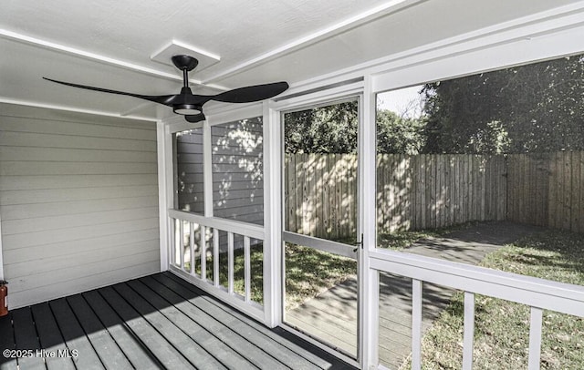 130 Salter Path Rd Unit 74, Pine Knoll Shores, NC 28512 - unfurnished sunroom featuring a ceiling fan