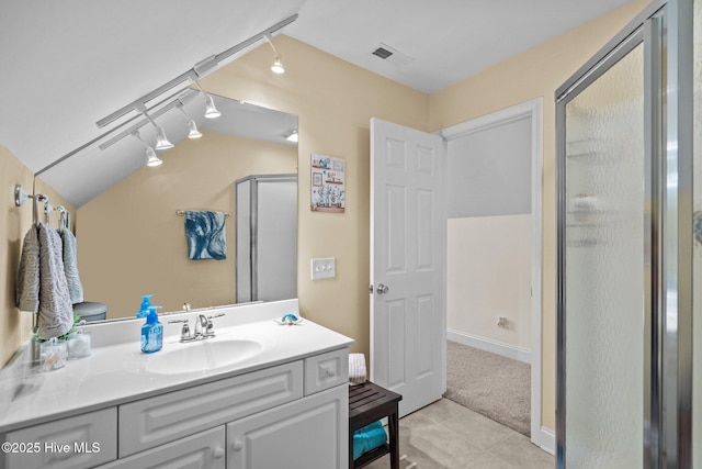 133 Graystone Rd, Wilmington, NC 28411 - full bath featuring a shower stall, vanity, tile patterned floors, and rail lighting