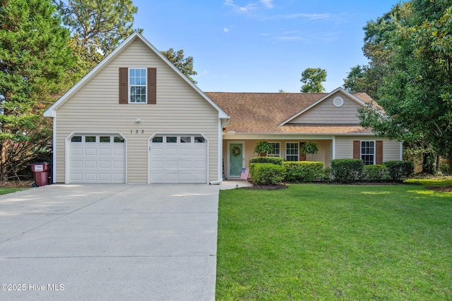 133 Graystone Rd, Wilmington, NC 28411 - traditional-style house featuring driveway, a garage, a front lawn, and a shingled roof