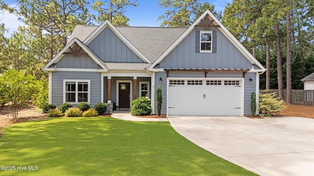 3 Glen Ross Dr, Pinehurst, NC 28374 - view of front of home with board and batten siding, roof with shingles, driveway, and a garage