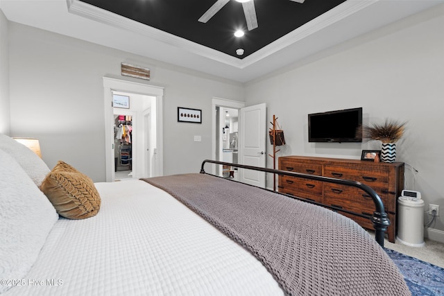 3 Glen Ross Dr, Pinehurst, NC 28374 - carpeted bedroom featuring ornamental molding, a spacious closet, ceiling fan, a raised ceiling, and a closet
