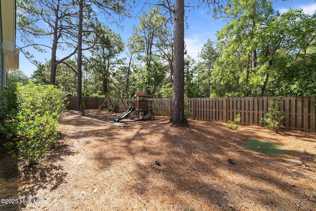 3 Glen Ross Dr, Pinehurst, NC 28374 - fenced backyard featuring a playground