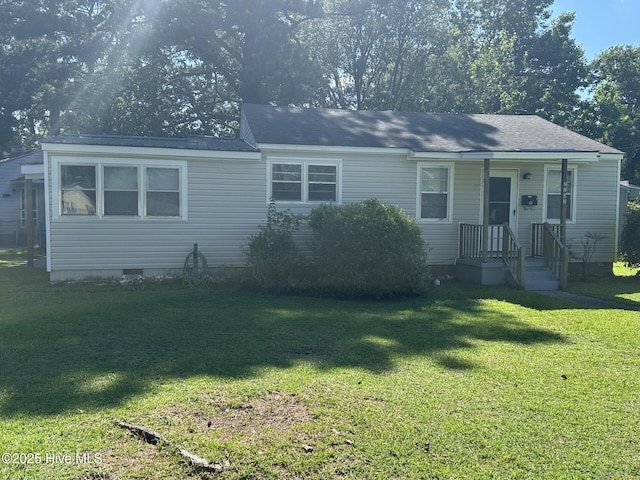 2203 High School Dr, New Bern, NC 28560 - view of front of home with crawl space and a front yard