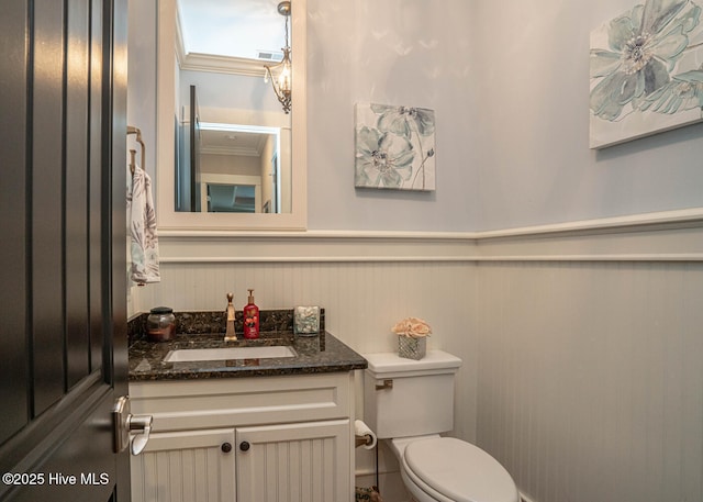 595 Wicklow Sq SW, Ocean Isle Beach, NC 28469 - half bathroom with wainscoting and vanity