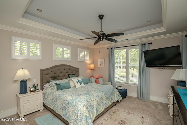 595 Wicklow Sq SW, Ocean Isle Beach, NC 28469 - bedroom with a raised ceiling, light carpet, ornamental molding, and a ceiling fan