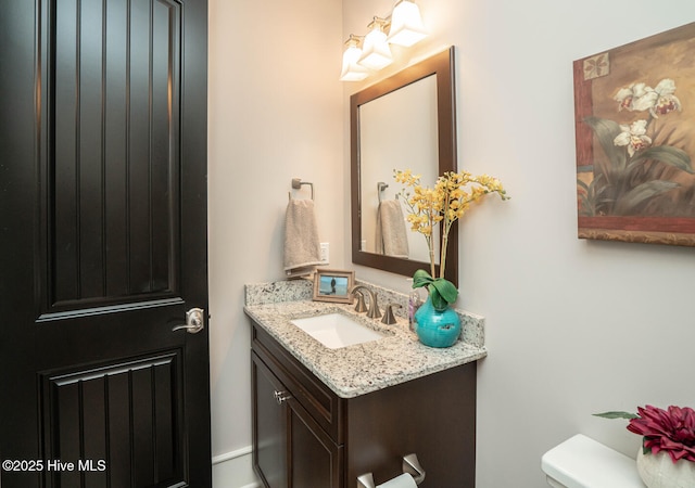 595 Wicklow Sq SW, Ocean Isle Beach, NC 28469 - bathroom featuring vanity and toilet