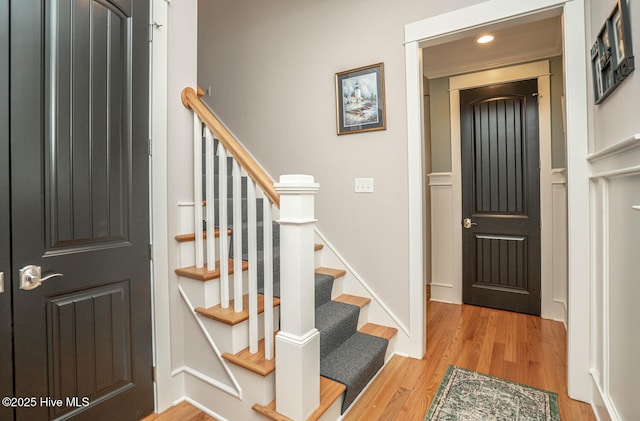 595 Wicklow Sq SW, Ocean Isle Beach, NC 28469 - foyer entrance featuring light wood-style flooring, stairs, and recessed lighting