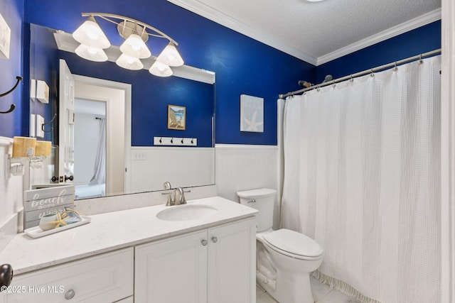103 Coppers Trl, Wilmington, NC 28411 - full bath featuring vanity, a wainscoted wall, ornamental molding, a textured ceiling, and curtained shower