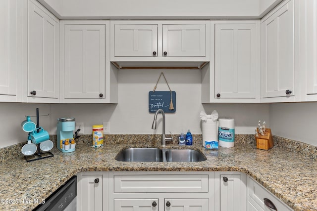 1004 Carolina Beach Ave S Unit B6, Carolina Beach, NC 28428 - kitchen featuring white cabinets, stainless steel dishwasher, and light stone countertops