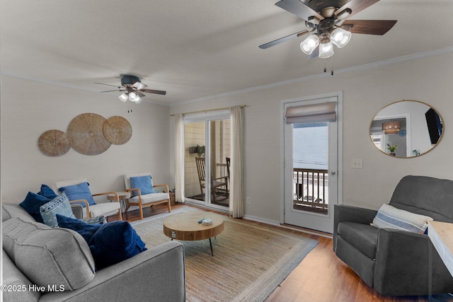 1004 Carolina Beach Ave S Unit B6, Carolina Beach, NC 28428 - living area with a ceiling fan, wood finished floors, and crown molding