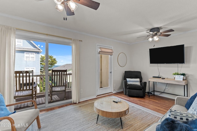 1004 Carolina Beach Ave S Unit B6, Carolina Beach, NC 28428 - living room featuring a ceiling fan, wood finished floors, and ornamental molding