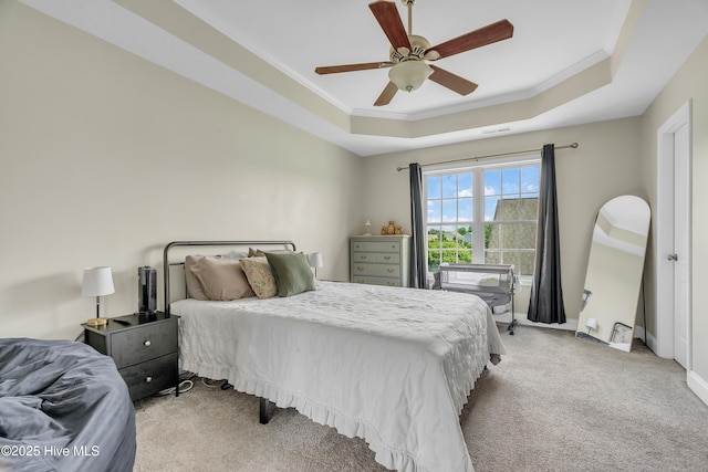 203 Mccain St, Beulaville, NC 28518 - bedroom featuring light carpet, crown molding, a tray ceiling, and ceiling fan