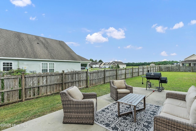 203 Mccain St, Beulaville, NC 28518 - fenced backyard featuring an outdoor hangout area, a patio area, and area for grilling