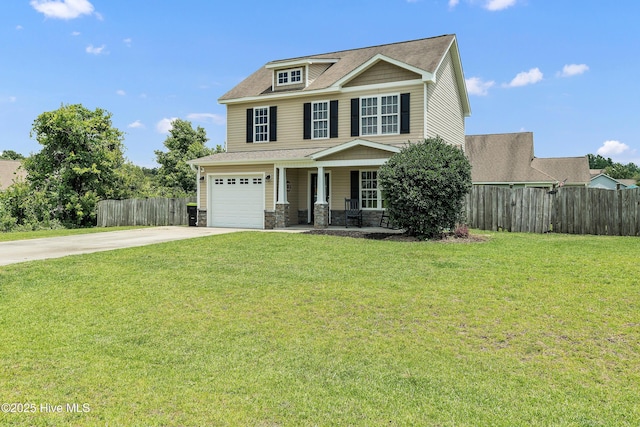 203 Mccain St, Beulaville, NC 28518 - view of front of property featuring driveway, covered porch, stone siding, and an attached garage