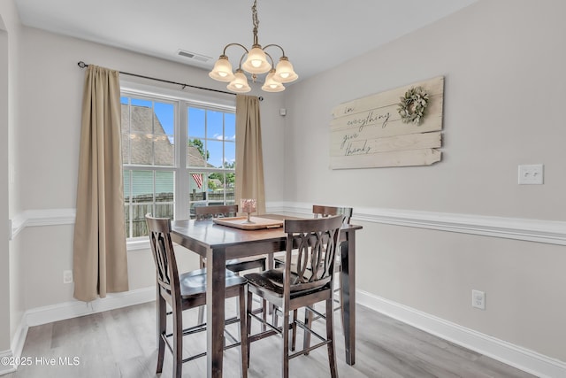 203 Mccain St, Beulaville, NC 28518 - dining area featuring a chandelier and wood finished floors