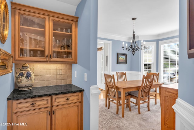 1514 Grandiflora Dr, Leland, NC 28451 - dining area featuring a chandelier and crown molding