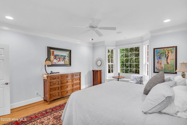 1514 Grandiflora Dr, Leland, NC 28451 - bedroom with light wood-style flooring, ornamental molding, recessed lighting, and ceiling fan