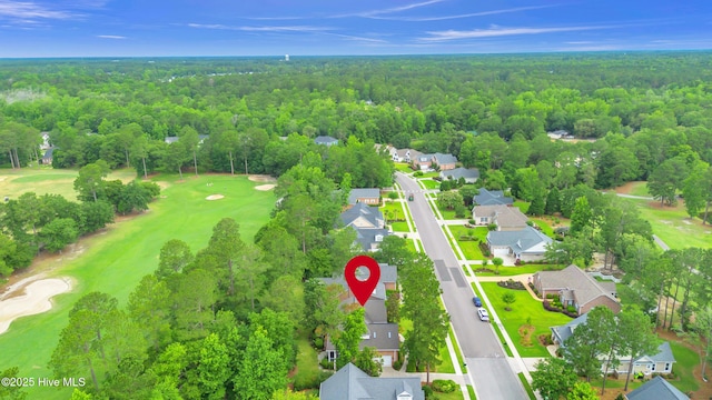 1514 Grandiflora Dr, Leland, NC 28451 - aerial view of residential area featuring a forest and a golf club