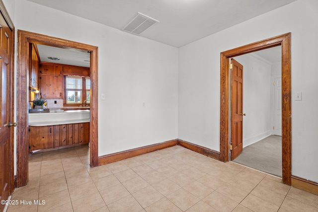 6074 NC-42 Hwy W, Macclesfield, NC 27852 - spare room with light tile patterned floors